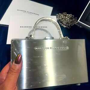 Brandon Blackwood - SLIM Metal Trunk